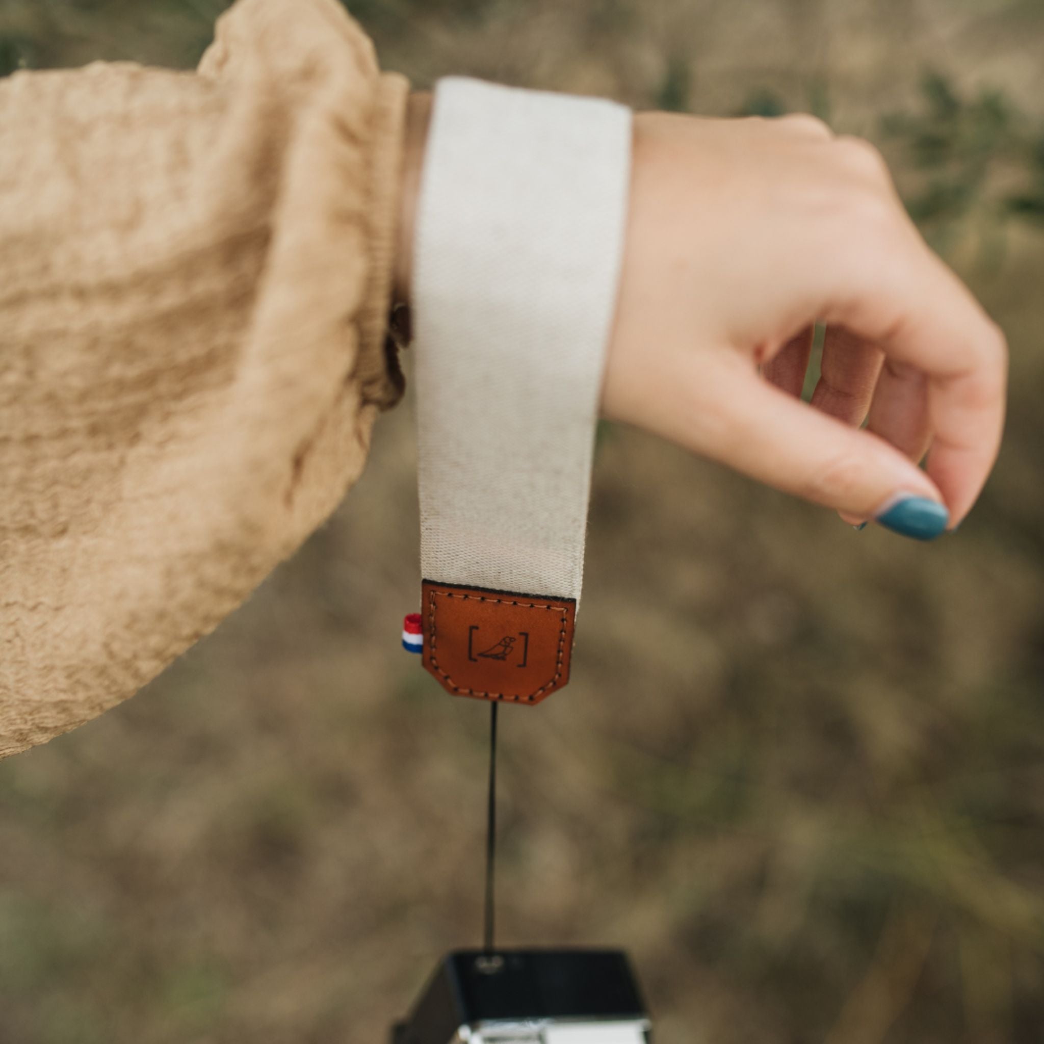 SANGLE DE POIGNET POUR APPAREIL PHOTO CAIRE